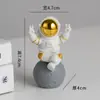 Muñeca decorativa creativa de astronauta caja sorpresa regalo muñeco de mano para niños adornos de escritorio de astronauta venta al por mayor