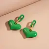 Pendientes de botón geométricos cuadrados y de corazón verdes transfronterizos europeos y americanos, Pendientes de botón de lujo ligero de alta gama, Pendientes de moda exagerados para mujer