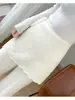 Nueva cortina corta de punto suave y con caída % lana pura para otoño e invierno para mujer, de cintura alta, adelgazante, con lazos, de color liso