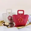 Caja de dulces de cuero portátil de boca cuadrada bolsa de dulces estilo ins de cuero bolsa de dulces para regalo de boda fábrica en stock