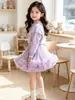 Conjunto de Duas Peças Cardigan de Tricô com Laço para Meninas 2026 Outono Novo Doce Suéter Infantil Roupa de Saia Tutu