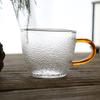 Tetera de vidrio martillado hecha a mano coleccionable asa amarilla vidrio resistente a altas temperaturas tetera separación de agua y té adorno de hoja amarilla tetera