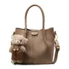 Bolsa Pequena Texturizada para Axila Feminina Nova Moda Primavera 2026 Versátil Bolsa de Ombro Design de Nicho Bolsa de Mão Bolsa Saco