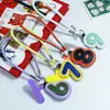 Novo Strap de Celular Pingente Digital de Couro da Huayang, Chaveiro Criativo Personalizado para Bolsa, Acessório Fofo