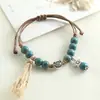 Pulseira de cerâmica com contas, pulseira tecida artesanalmente de nicho, estilo étnico colorido, joia artística versátil, ajustável e não desbota