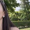 Fiebre de estilo navideño y de Año Nuevo con pendientes de amor plateados tridimensionales, pendientes de clip para orejas con forma de corazón de melocotón, simples y de alta gama, para mujer