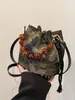 2026 Nuevo Estilo Chino Casual Bordado de Mariposas Moda Primavera/Verano Bolso de Mano de Alta Gama con Cuentas Bolso Cubo Versátil de Estilo Nacional