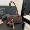Bolso de mujer transfronterizo de gran capacidad, nuevo diseño retro 2026, estilo nicho, bolso de hombro moderno, adecuado para el trabajo y los desplazamientos, bolso de hombro