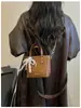 Bolso Tote Pequeño Súper Caliente para Viaje de Trabajo de Mujer 2026 Nuevo Verano Textura Tejida Retro Bolso Cubo de Hombro Único Cruzado