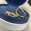 Pendientes de Herradura Fre/Fred Chapados en Oro de Alta Gama con Diseño de Giro Completo de Diamantes, Pendientes Versátiles de Lujo Ligero para Mujer