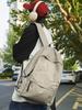 Mochilas escolares nuevas de gran capacidad transfronterizas para hombres y mujeres 2024 nueva mochila para estudiantes de comercio exterior mochila casual ligera