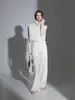 Chaleco de punto suelto adelgazante con cuello alto apilado estilo francés y pantalones rectos de pierna ancha para otoño-invierno, modelo nuevo de nicho 2026