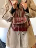 Bolso de Cuadros de Alta Gama para Mujer Transfronterizo Otoño e Invierno 2026 Nueva Moda Lazo Elegante Versátil Mini Mochila Tendencia