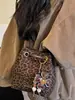Bolsa tote casual retrô, estilosa e de alta qualidade, nova coleção outono 2026, cor sólida, design chique, adequada para o trabalho e para o trajeto diário.
