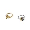 Marca de moda coreana aretes de círculo de tres anillos de diamantes estrella con personalidad masculina aretes de calle hip-hop acero de titanio al por mayor