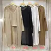 Estilo de Moda Transfronteiriça Elegante Roupa Exterior Cardigan de Malha para Mulheres 2025 Novo Solto Vazado Comprimento Médio Suéter Fino Conjunto de Duas Peças