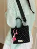2026 Verano Nuevo de Moda Gran Capacidad Estilo Coreano Lunares Moderno Casual para Viajes Diarios Cruzado de Alto Valor Bolso Cruzado de Hombro Tipo Cubo