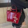 Grande capacidade elegante moda mão-transporte texturizado bolsa feminina 2023 novo nicho francês simples ombro cor sólida bolsa crossbody