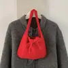 Nuevo bolso tote casual 2026 para el uso diario, estilo coreano, bolso de mano de punto chic y versátil