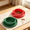 Comedero para mascotas con temática navideña, comedero anti-derrames para perros y gatos, diseño de colores rojo y verde, utensilio festivo para alimentar mascotas
