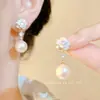 Pendientes de Borla con Cuentas en Forma de Corazón 2025 Pendientes de Estilo de Alta Gama de Moda Nuevos Pendientes de Diseño de Nicho Accesorios