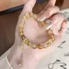 Pulsera de Citrino Amarillo Natural, Pulsera de Cristal Amarillo Torre, Diseño Atractor de Riqueza, Estilo Chino Nuevo Lirio del Valle Joyería de Alta Gama al por Mayor