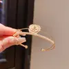 Pulsera Abierta de Doble Capa Geométrica de Flor de Circonia Estilo Lujo Ligero, Accesorio de Moda Versátil Exquisito Francés con un Toque de Alta Gama