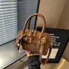 Bolso de mano de alta gama, nicho para mujer, nueva colección otoño/invierno 2026, bolso cruzado retro y versátil, estilo coreano, bolso tote tipo almohada texturizado