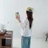 Colección Otoño 2026: Cuello de encaje estilo japonés, dobladillo abotonado de colores, blusa casual de manga larga con encaje para mujer