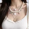 Zoozmomo Collar Estilo Bohemio de Concha Estrella de Mar Perla para Mujer Collar de Lujo Ligero Cadena de Clavícula Multicapa de Gama Alta