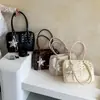 Bolso de axila Y2K con tachuelas de nicho coreano para mujer, bolso Boston de un solo hombro de gran capacidad estilo chica hot del milenio para principios de otoño, moderno