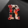 Moda Retro Diamantes de Imitación Perla Letra Corsage Broche Hermano Amash Estilo Coreano de Alta Gama Pin para Ropa de Abrigo