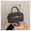 Colección de otoño: Bolsa de mezclilla tipo bowling para mujer, nuevo estilo 2026, con un tacto de alta gama y lujoso, un bolso de hombro o bandolera único y elegante