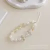 Novo Pulseira de Contas Borboleta com Glitter Corrente de Celular de Nicho Pulseira de Laço Anti-Perda Pingente para Mochila Conjunto de Fones de Ouvido