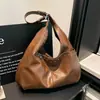 Bolsa Tote Personalizada para Motocicleta Estilo Retrô para Mulheres 2026 Lançamento Primavera Nova Versátil Leve Casual Bolsa de Mão Bolsa de Ombro