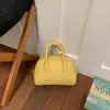 Bolsa pequena de concha requintada estilo coreano, nova para a primavera de 2026, bolsa de mão simples e texturizada, bolsa de ombro e transversal