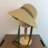 Sombrero de Paja Tejido Nuevo Producto Transfronterizo Alta Calidad Copa Redonda de Atar Estilo Francés Ala Ancha Sombrero de Protección Solar Fábrica Mayorista Sombreros para Mujer