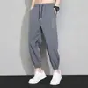 Pantalones de verano finos de seda helada para hombre, corte holgado, con puño en los tobillos, pantalones deportivos de nueve puntos, pantalones de aire acondicionado de secado rápido, pantalones largos casuales para hombre