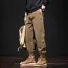 Atacado do fabricante comércio exterior calças de trabalho estilo americano para homens, corte solto vintage, tamanho europeu, calças jogger casuais versáteis para primavera e outono