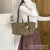 Moda japonesa y coreana retro simple estampado de leopardo bolsa de lona para el día a día 2026 nuevo para mujer otoño bolso de mano de un solo hombro bolsa de axila