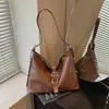Bolso de hebilla de cinturón vintage de alta calidad para mujer, nuevo bolso versátil 2026 para hombro cruzado de viajero, bolso casual de axila