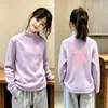 2026 Outono/Inverno Nova Camiseta de Manga Longa para Meninas Camada Base Lã Alemã Infantil Estilosa Quente Crianças Médias e Grandes Top Versátil