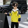 Chaqueta de Primavera y Otoño para Niños 2026 Nuevo Modelo Cortavientos con Capucha de Otoño para Niños Abrigo a Prueba de Viento de Tres en Uno de Corteholgado