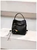 Bolsa balde elegante e estilosa com padrão de lichia, bolsa versátil para mães e filhas no dia a dia, nova bolsa de ombro e transversal super popular