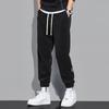 Pantalones deportivos de primavera y otoño para hombre, pantalones de chándal de moda, pantalones holgados tipo dapper, pantalones casuales Harlan de moda, pantalones juveniles de talla grande