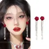 "Manzhu Sha Hua" Pendientes de Borla de Lirio del Valle Rojo Retro Lujo Accesible Pendientes Elegantes Pendientes de Atmósfera de Año Nuevo para Mujer