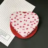 Superventas transfronterizo soporte magnético con airbag en forma de corazón con estampado de lunares de dibujos animados, soporte magnético para teléfono retráctil y plegable