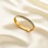 Pulsera transfronteriza nueva de acero inoxidable hueco con patrón de la Gran Muralla en ambos lados, hebilla de titanio con taladro, oro de 18k, no se decolora
