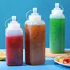 Botella exprimible de gran calibre, estilo japonés, con tapa y boca puntiaguda, ideal para cocinar, para salsa de miel y ketchup.
