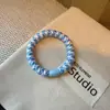 Elástico para el Cabello de Alta Elasticidad Elegante y Versátil con Diseño Único para Coletas Altas, Peinados de Moño y Accesorios para el Cabello de Goma